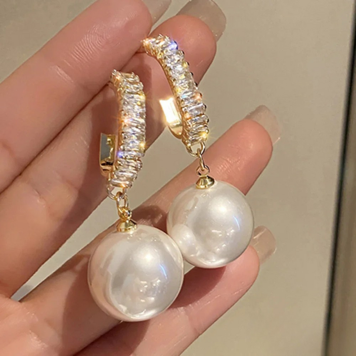 Boucles d'oreilles de luxe avec perle et zirconium