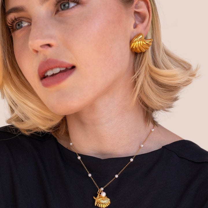Boucles d'oreilles en coquillage doré