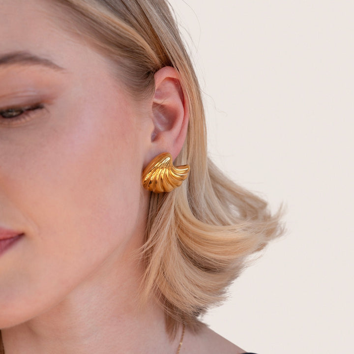 Boucles d'oreilles en coquillage doré