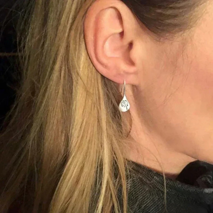 Boucles d'oreilles en argent finement travaillées en forme de feuille de pissenlit