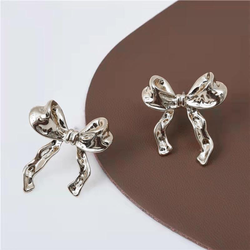 Boucles d'oreilles en forme de nœud pour bébé