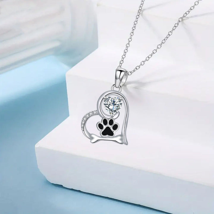 Collier en forme de patte de chien et d'os fait main avec zirconia