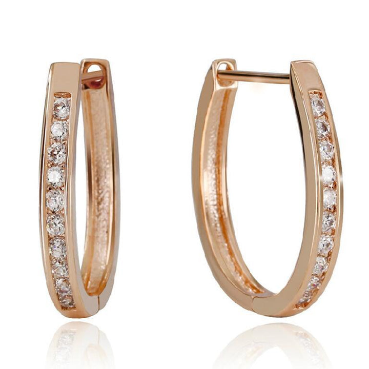 Boucles d'oreilles en créoles dorées de luxe
