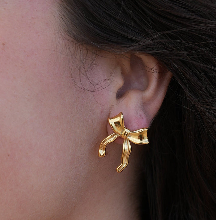 Boucles d'oreilles en forme de nœud pour bébé