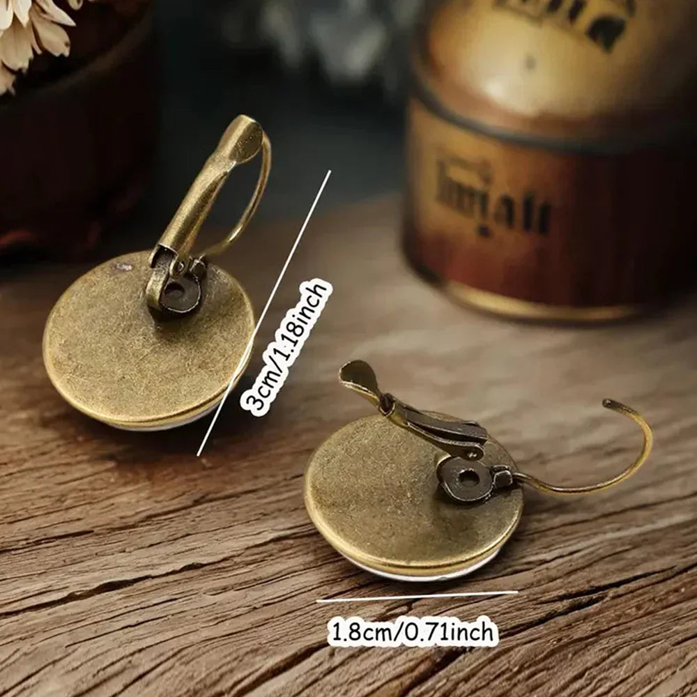 Boucles d'oreilles en verre sous dôme avec animaux fantaisistes