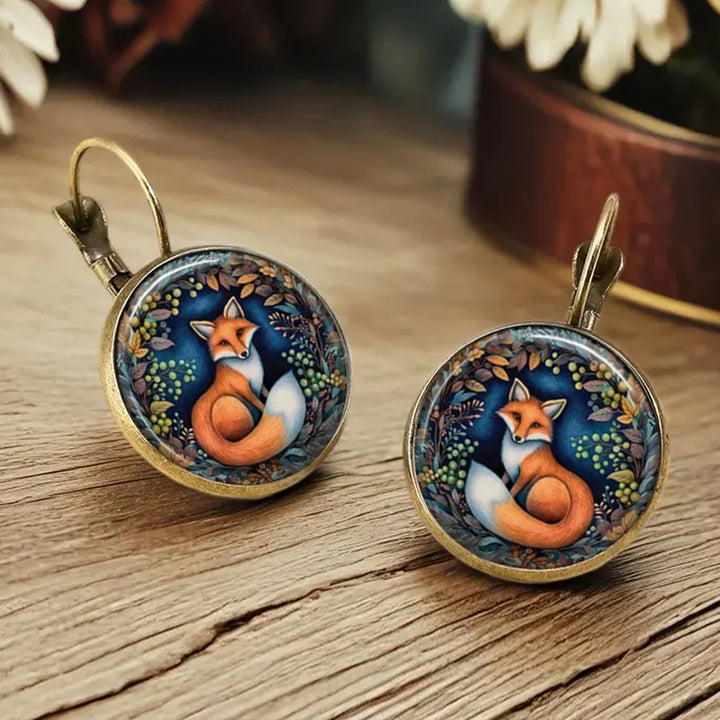 Boucles d'oreilles en verre sous dôme avec animaux fantaisistes