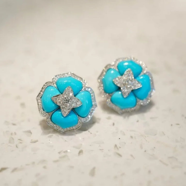 Boucles d'oreilles sophistiquées en argent bleu et fleurs
