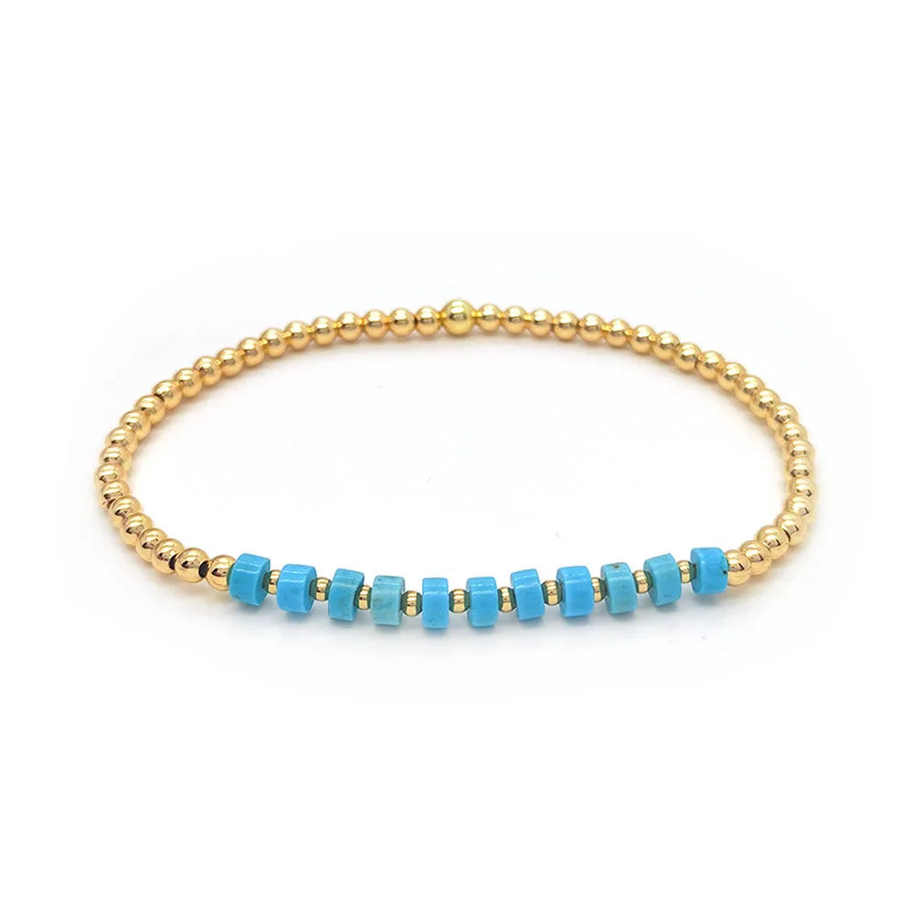 Bracelet en perles de turquoise vintage avec pendentif croix