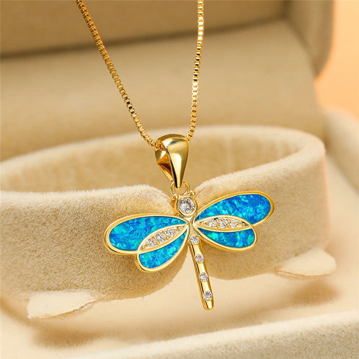 Collier papillon en or avec opale