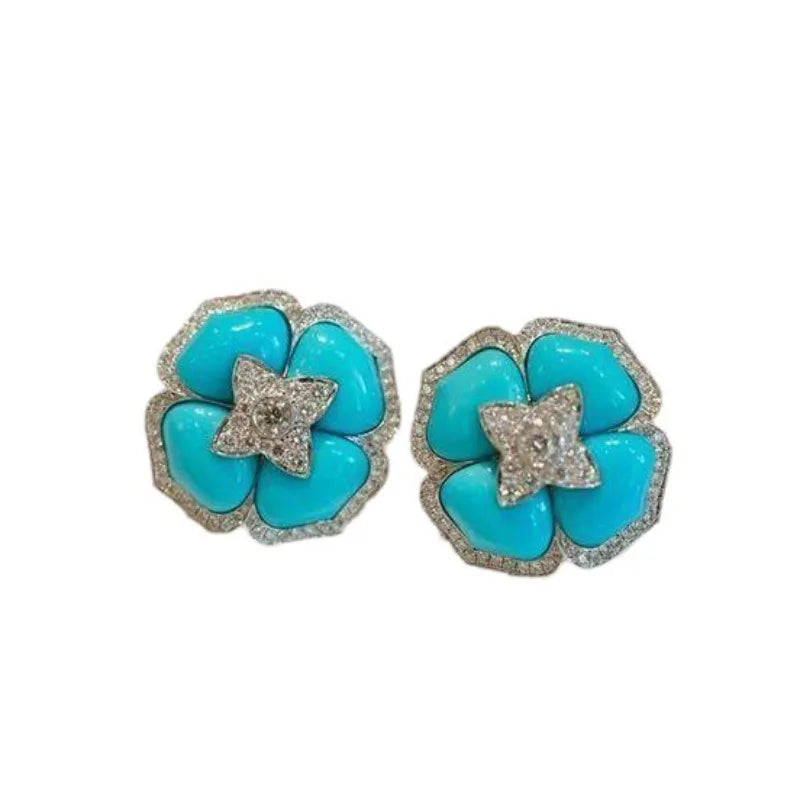 Boucles d'oreilles sophistiquées en argent bleu et fleurs