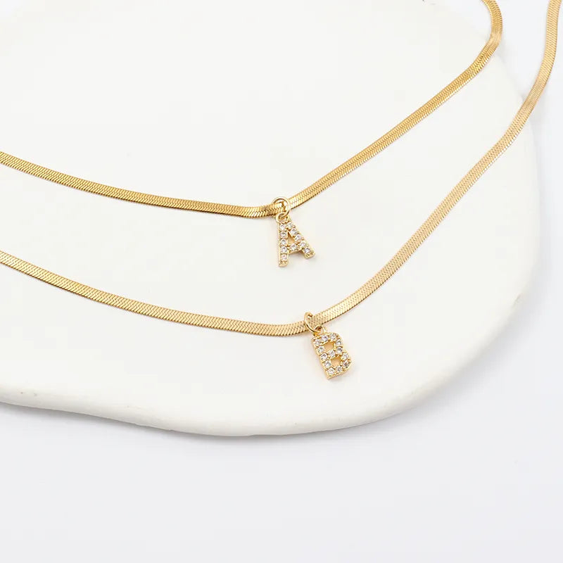 Collier Herringbone Initiale en Diamant Melly®