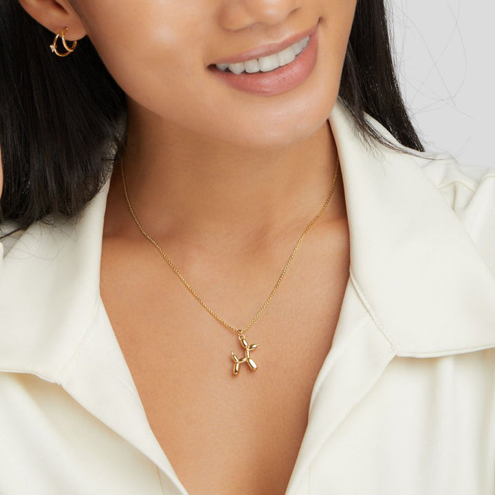 Collier en forme de ballon doré