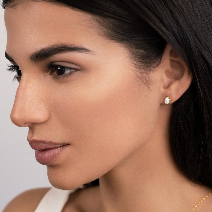 Boucles d'oreilles en opale dorée
