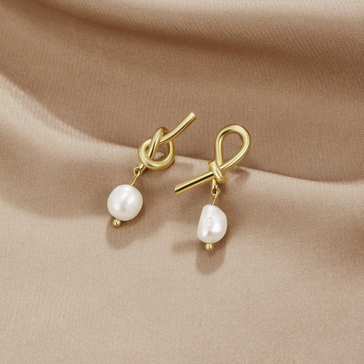 Boucles d'oreilles en perles d'eau douce et en or
