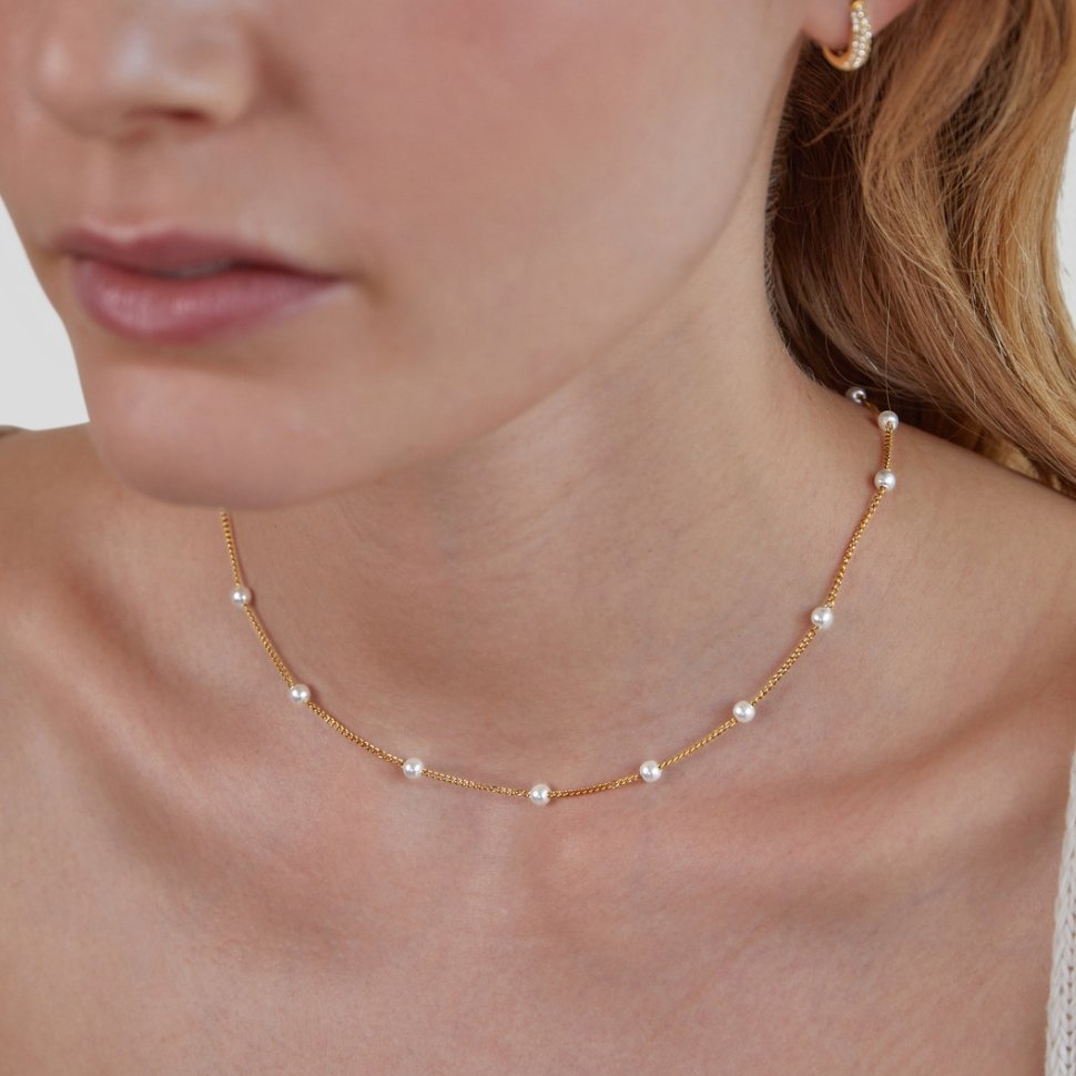 Collier en perles dorées Reine