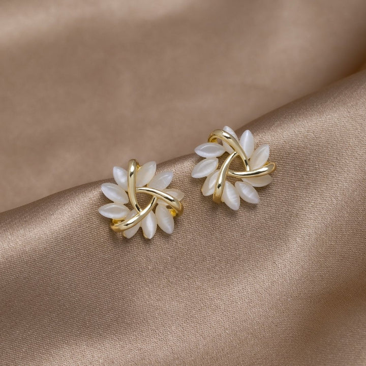 Boucles d'oreilles en or avec fleurs en opale