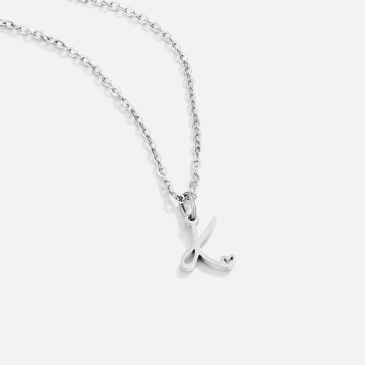 Collier en forme de cœur avec lettres en argent